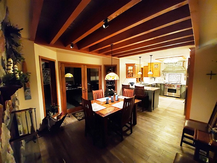 A wood wrap creates a rustic beam look